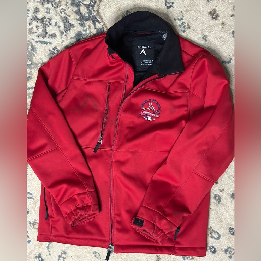 Red & black 2011 World Series St. Louis Cardinals jacket with a few minor stains
